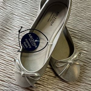 Kids brand new flats in silver.